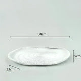 Samtida dekorativ skål i resin med naturinspirerad design - stiligt och mångsidigt accentstycke Carvallo