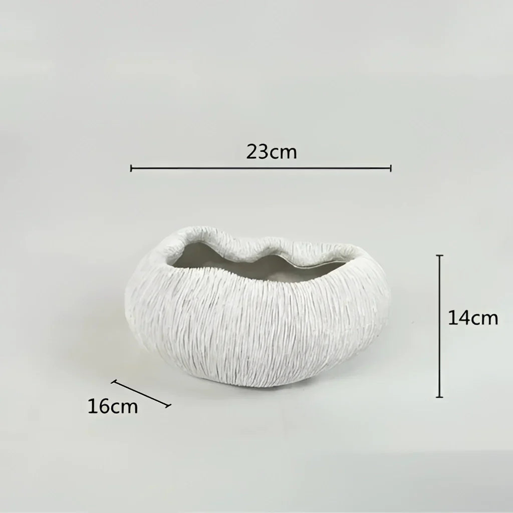 Samtida dekorativ skål i resin med naturinspirerad design - stiligt och mångsidigt accentstycke Carvallo