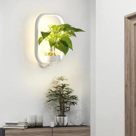 Vägglampa med glasväxtbehållare Carvallo