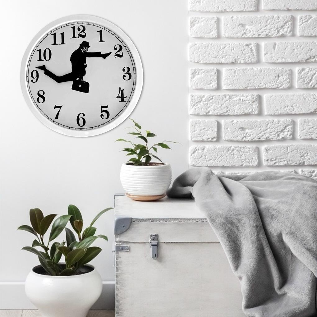 Carvallo – Kreativt väggur med unik illustration av rörlig man och coola siffror Carvallo