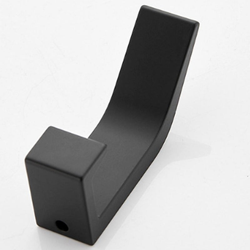 Dekorativa svarta och vita väggkrokar i aluminium för stilfull förvaring Carvallo