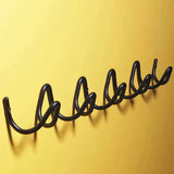 Modern väggklädhängare med elegant design och minimalistisk stil Carvallo