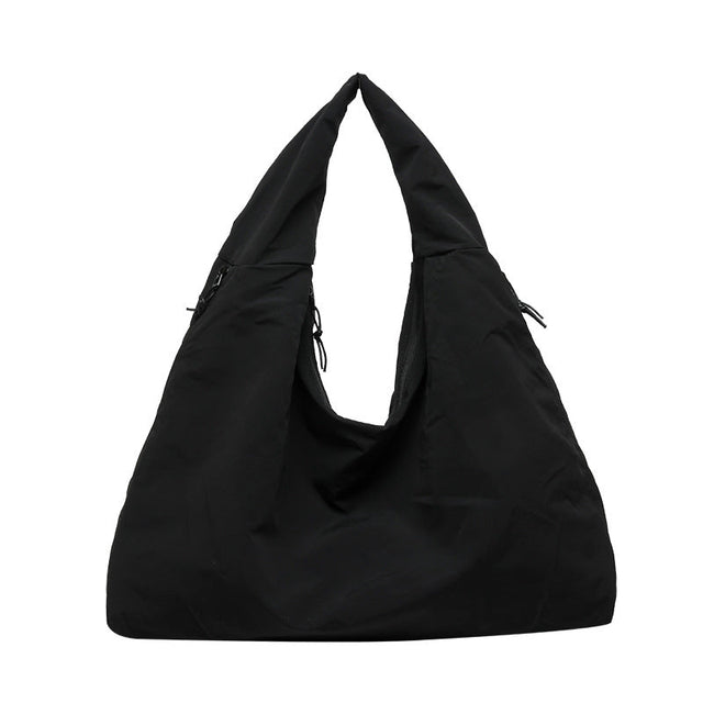 Praktisk och stilfull dam multifunktionshandväska Carvallo