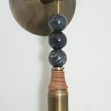 Persepolis-inspirerad marmor- och mässingsväggsconce Carvallo