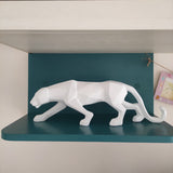 PantherGrace - Elegant geometrisk skulptur som symboliserar mod och makt Carvallo