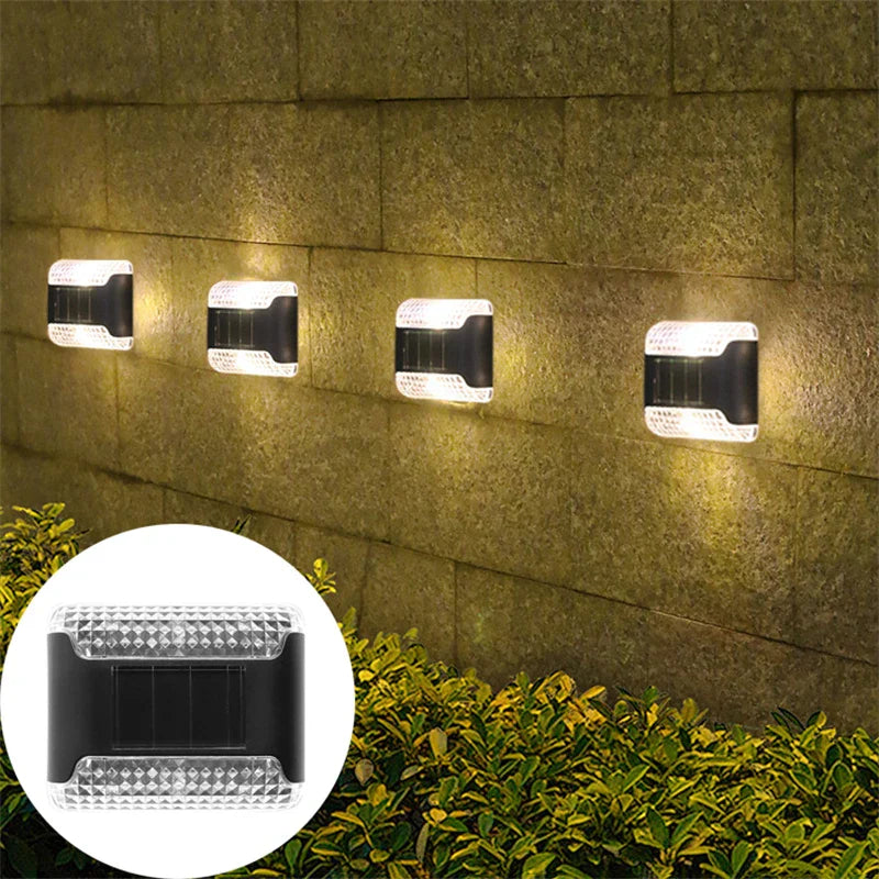 Carvallo Solar-vägglampa i 4-pack | Rörelsesensitiv | IP65 Vattenskydd | Varmvitt LED-ljus Carvallo