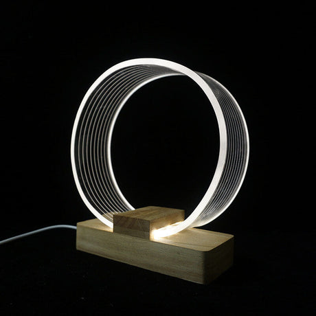 Nordic Minimalist Ringlampa – Genomskinlig akryl med träfot MILA Sverige