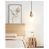 Pendellampa Travertin – Högkvalitativ, varm belysning för vardagsrum i naturlig stil Carvallo