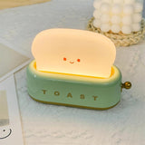 GlowToast Lampa – Bärbar Bröd-Toast Cartoon LED Nattlampa Carvallo