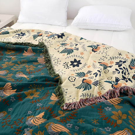 Vändbar Boho-filt – Broderad naturinspirerad mysfilt för stil och komfort Carvallo