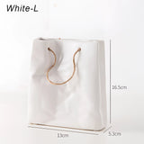 Tidlösa keramikvasdesign i stil med en shoppingkorg – Elegant vas för torkade blommor Carvallo