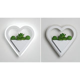 EcoChic Glow - Minimalistisk nordisk konst växtväggslampa för stilfulla glödande Carvallo