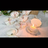 Romantiska snäckskalljusgåvor - 10 doftande bitar med sojavax och freesia och rosa banddekorationer MILA Sverige