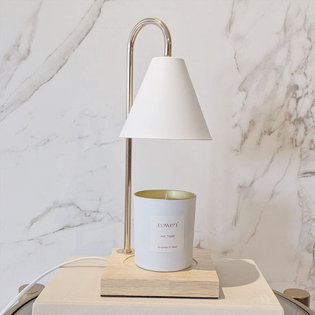 Carvallo – Lyxigt Ljusvärmare med Eleganta Gulddetaljer Carvallo