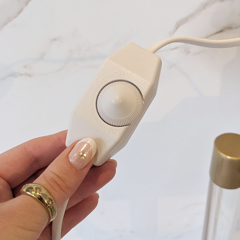 Carvallo – Lyxigt Ljusvärmare med Eleganta Gulddetaljer Carvallo