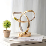 Golden Möbius Loop Skrivbordslampa – Lyxig Glow MILA Sverige