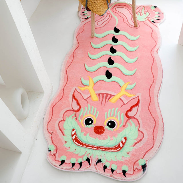 SnuggleNest - Rund matta med nyckfullt drakeskratt MILA Sverige