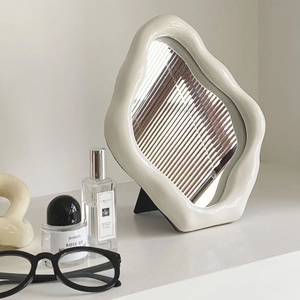 Squiggly Mirror - Nordisk elektropläterad silverdesign Carvallo