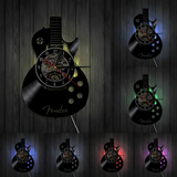 Vinyl Gitarr Klocka | Unik LED Väggdekoration för Musikälskare Carvallo
