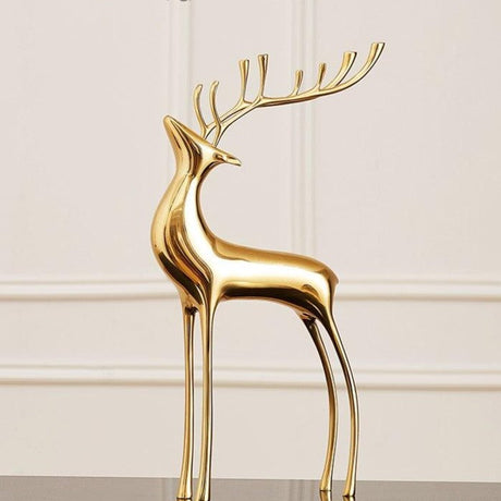 Dekorativa gyllene renfigurer för julhemdekoration Carvallo