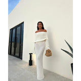 Anika Dress - Elegant bodycon knit dress with off-shoulder design Carvallo