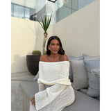Anika Dress - Elegant bodycon knit dress with off-shoulder design Carvallo