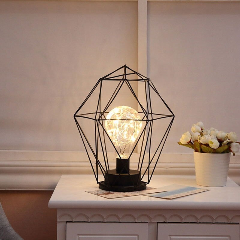 Industriell batteridriven sänglampa med färgglada pärlor Carvallo