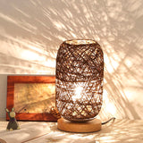 Rattan och trä sänglamp med modern bokdesign Carvallo