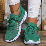 Andningsaktiva stickade sneakers för kvinnor