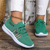 Andningsaktiva stickade sneakers för kvinnor