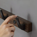 Carvallo - Minimalistisk väggkrok med naturlig träådring och slät finish Carvallo