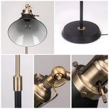 Metallgolvlampa – Svart med guldaccenter | Industriell design Carvallo