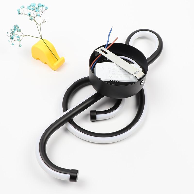 MozartGlow - Elegant musikenota-vägglampa för en harmonisk prägel på ditt rum Carvallo