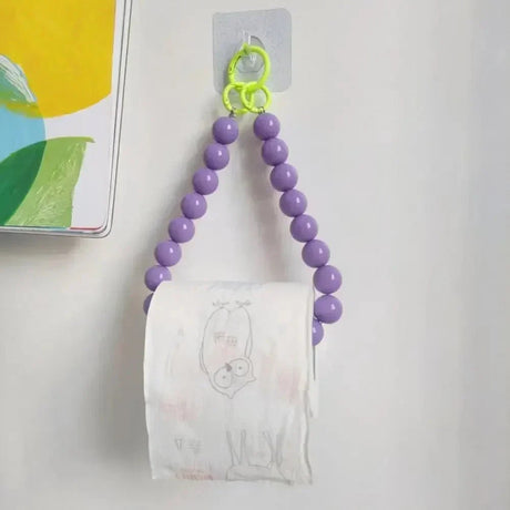 Toalettpappershållare med pärlor – en dekorativ touch för moderna badrum MILA Sverige