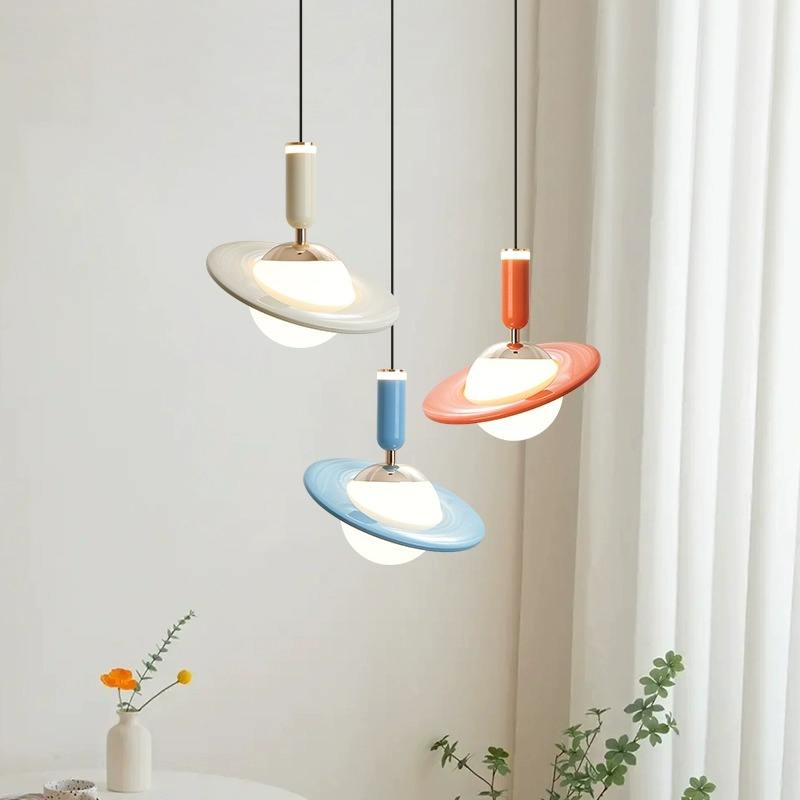 OrbitGlow – Saturn-inspired pendant lamps in playful pastel colors Carvallo