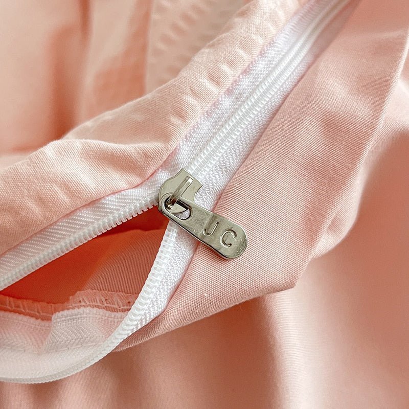 Enkelpastellfärgad sängklädset Carvallo