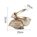 Topika – Skulpterad pelikankorg i harts MILA Sverige